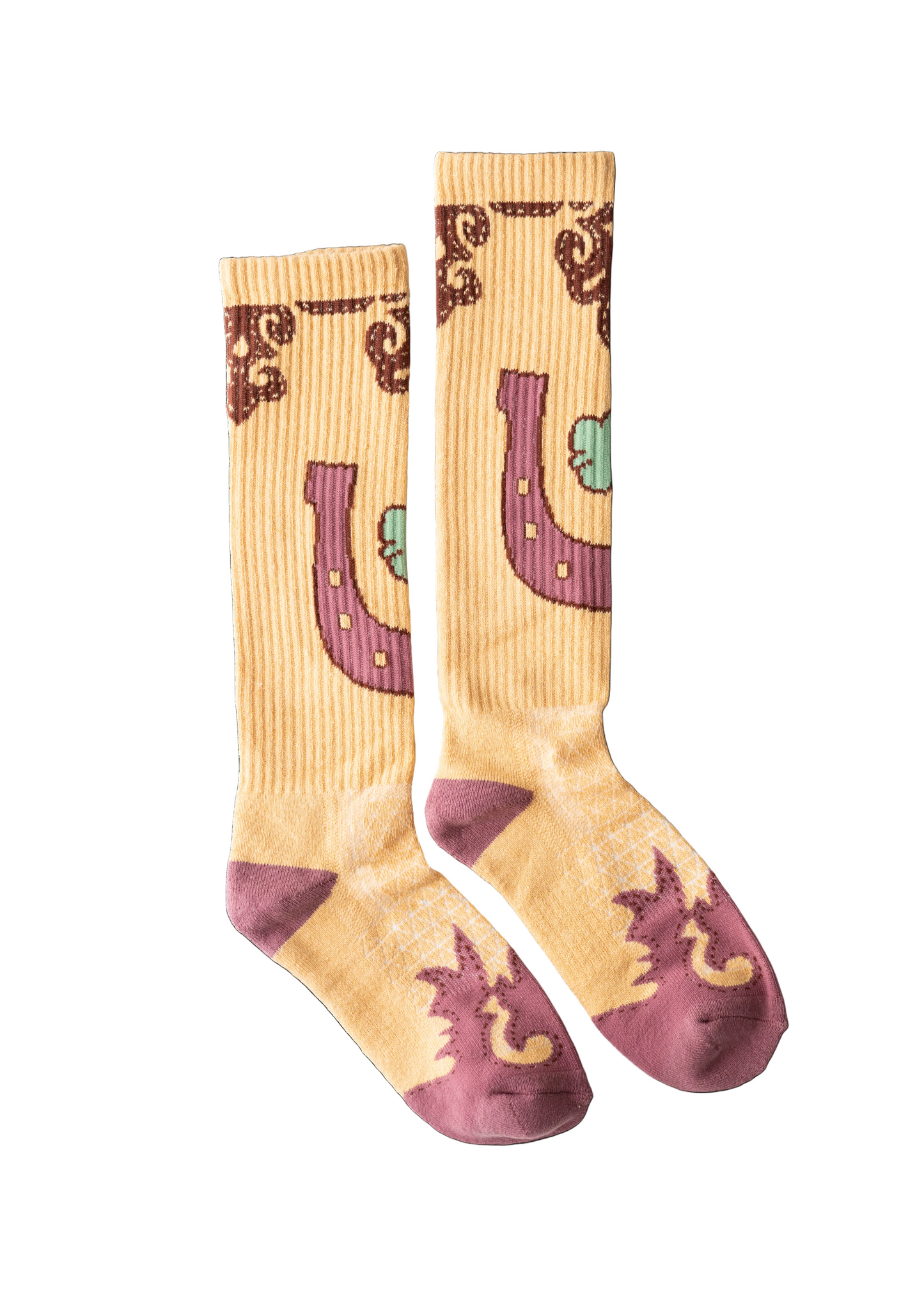 Pair of socks with horse shoe design on a beige background