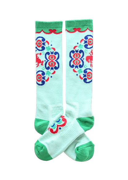 Colorful socks with floral patterns on a white background