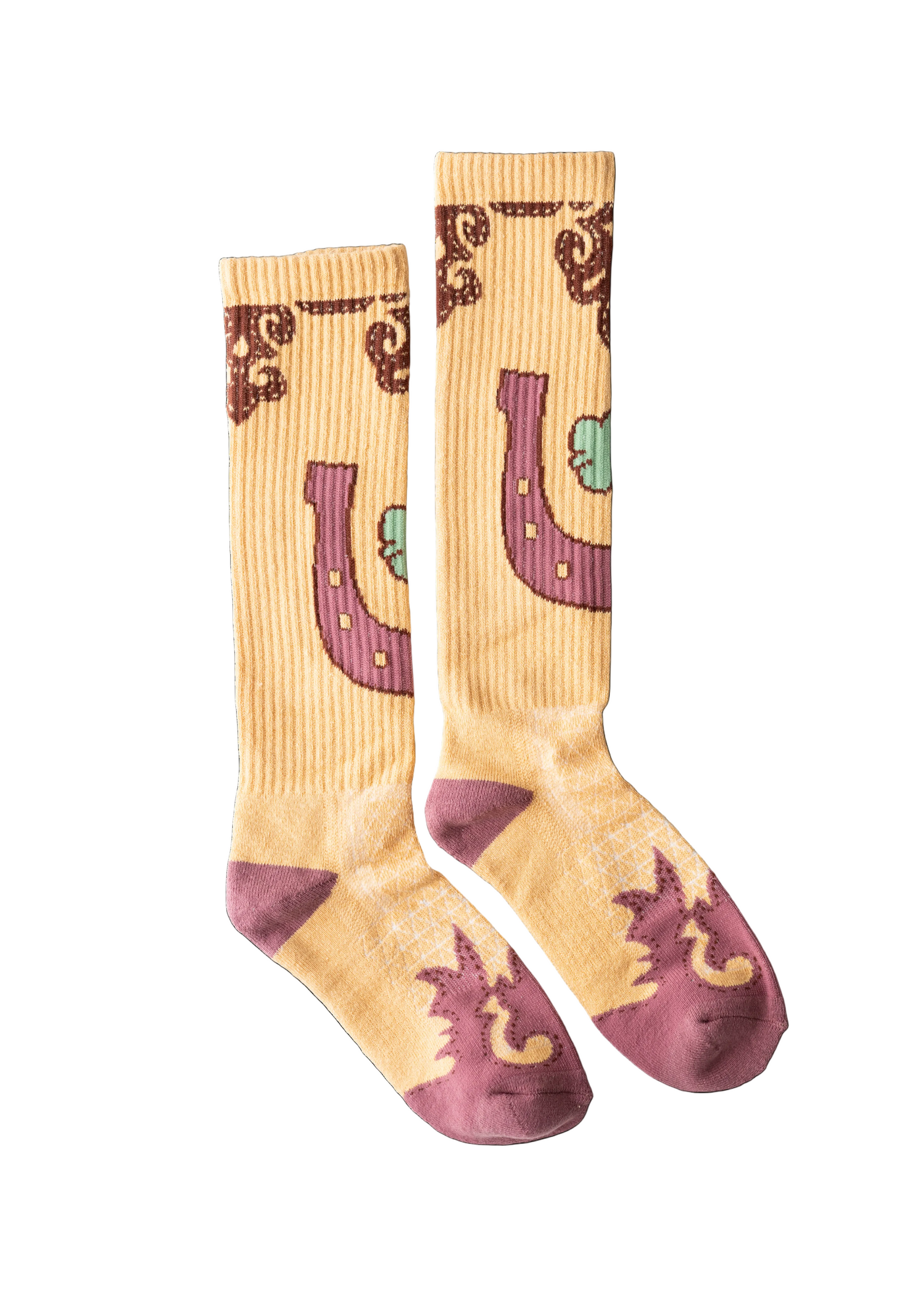 Pair of socks with horse shoe design on a beige background