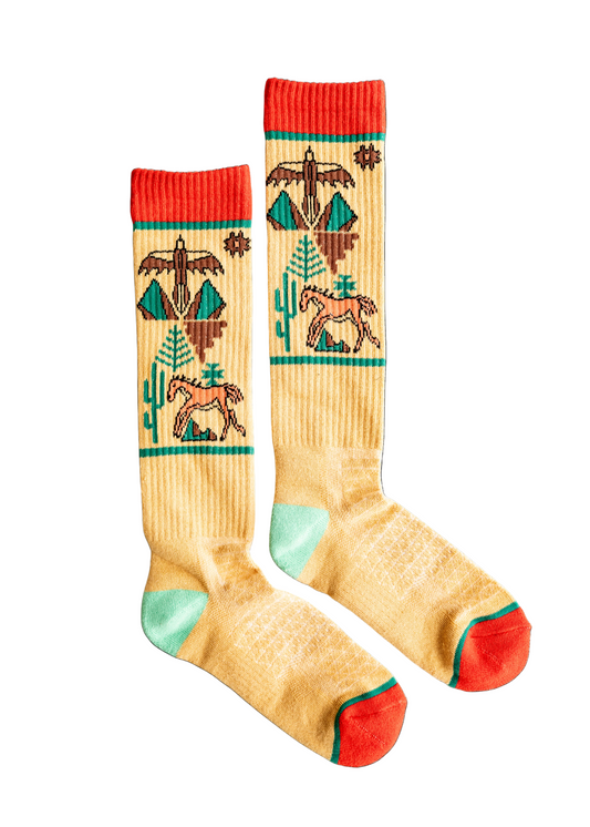 Pair of socks with nature-themed design on a white background