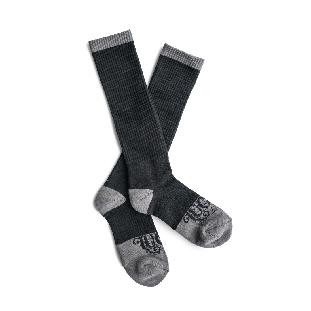 Pair of black and gray socks on a white background