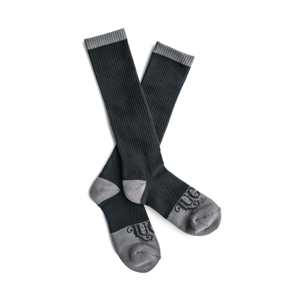 Pair of black and gray socks on a white background